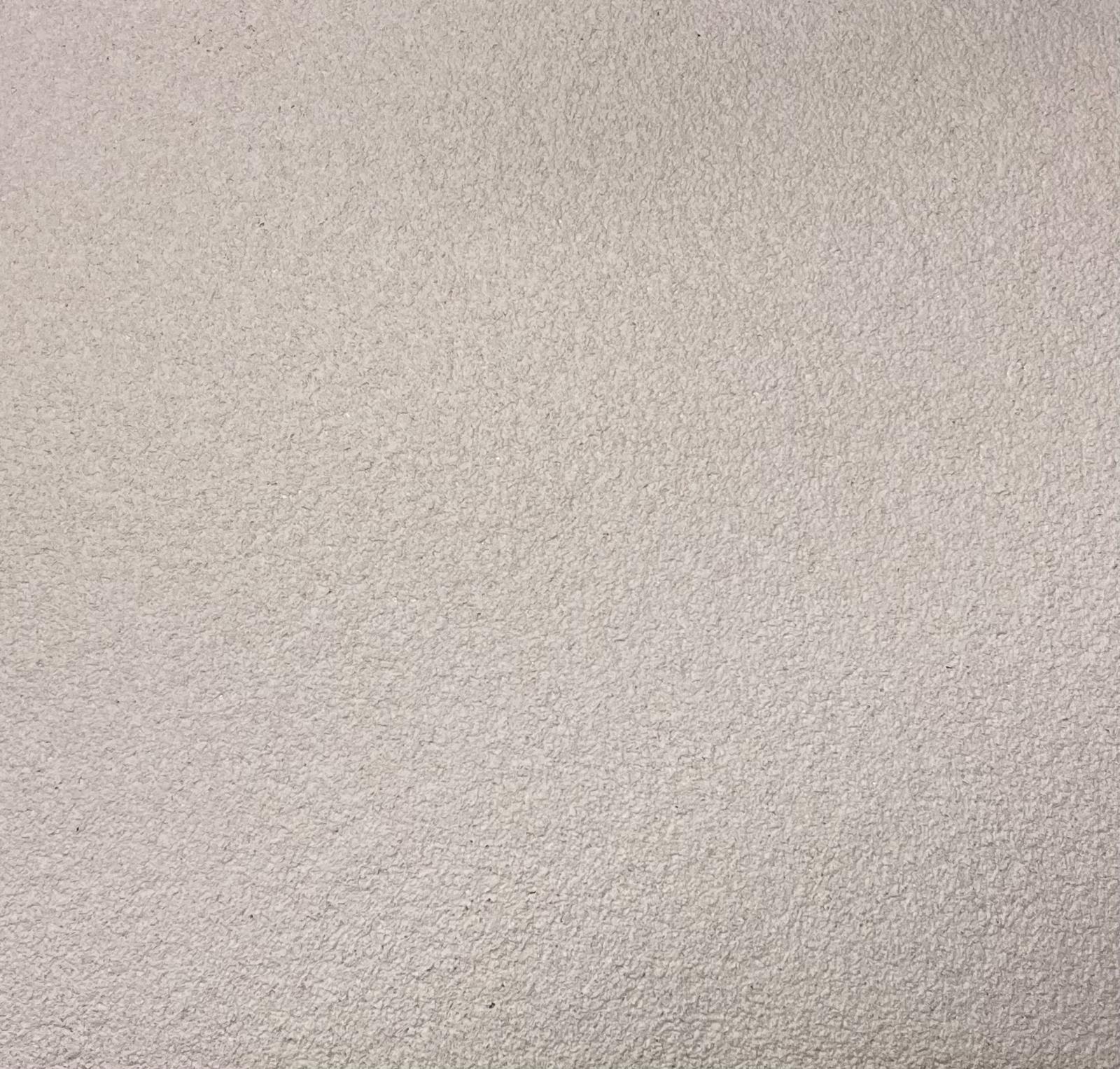 Floxxan Flüssigtapete in Apricot neu - feine textile Struktur für edle Wandgestaltung im Wohnzimmer.
